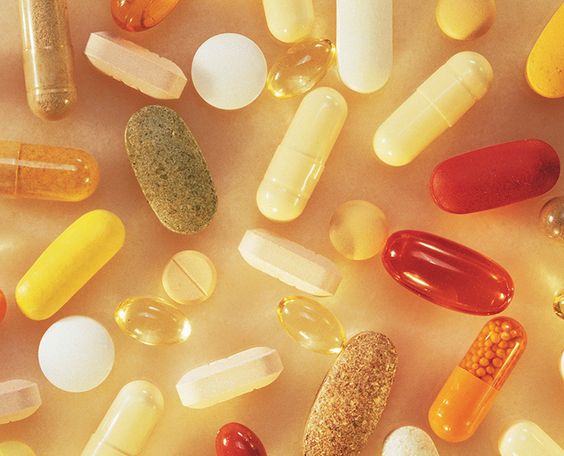 HTML We are showing carious capsules and tablets containing vitamins+supplements and when to take